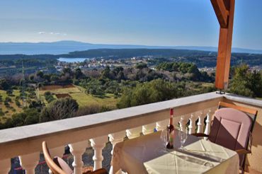 view from the balcony of the apartment, view of the town of Rab